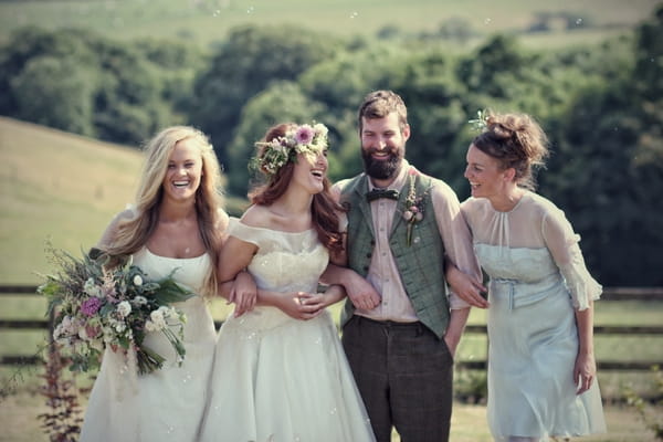 Vintage brides and groom laughing