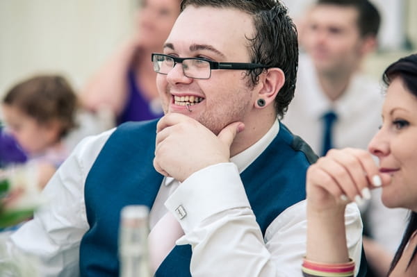 Man listening to wedding speech