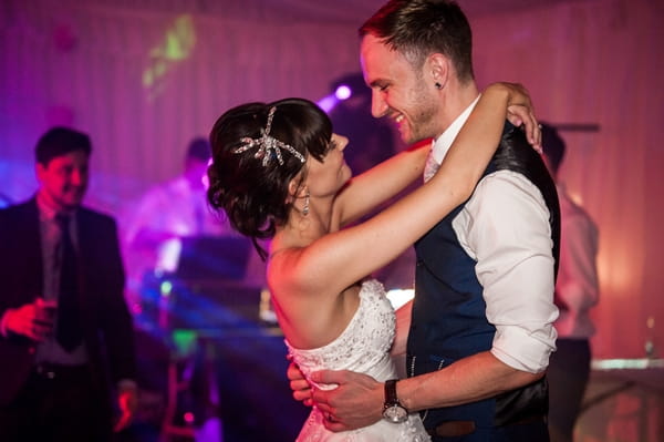 Bride and groom dancing