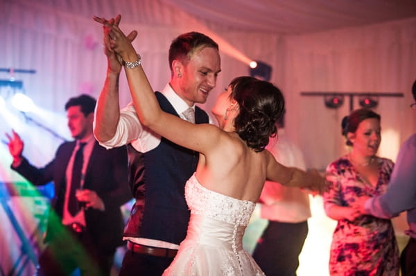 Bride and groom dancing