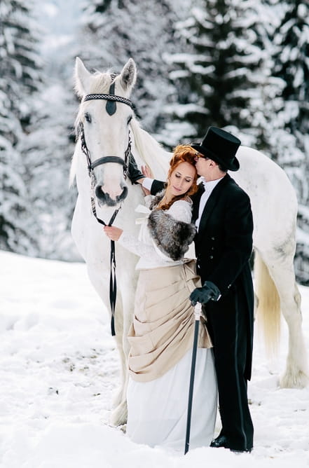 Bride and groom with horse