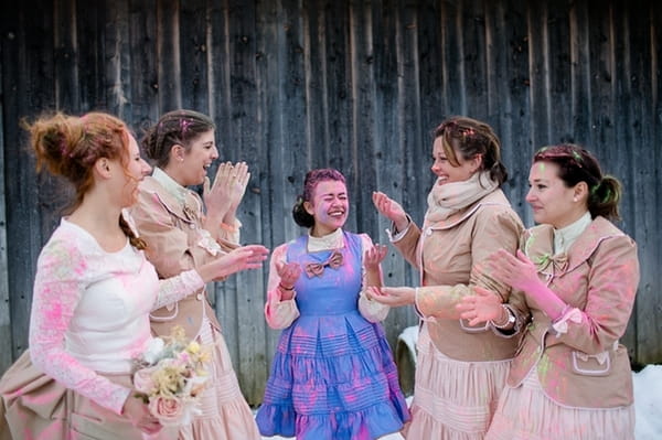 Bridesmaids covered in holi powder