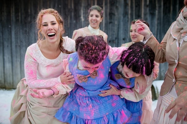 Bride and bridesmaids covered in holi powder