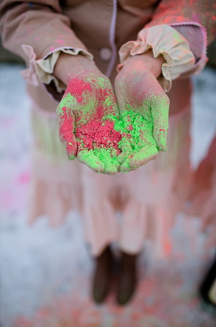 Bridesmaid holding holi powder