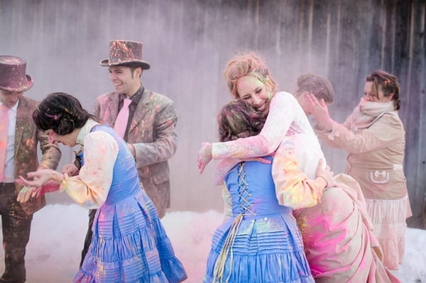 Bride and bridesmaid covered in holi powder