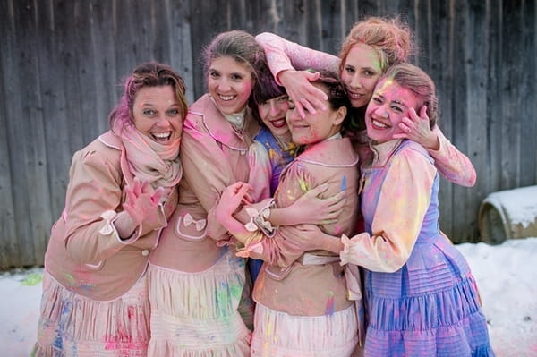 Bridesmaids covered in holi powder