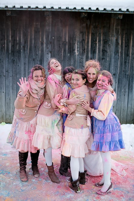 Bride and bridesmaids covered in holi powder