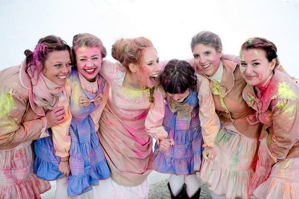 Bride and bridesmaids covered in holi powder