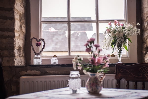 Vase of flowers on table