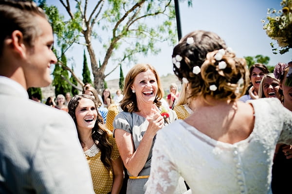 Bride and groom with guests