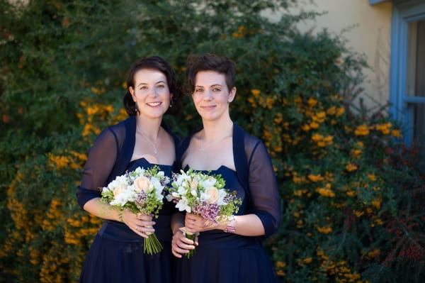 Bridesmaids in blue dresses