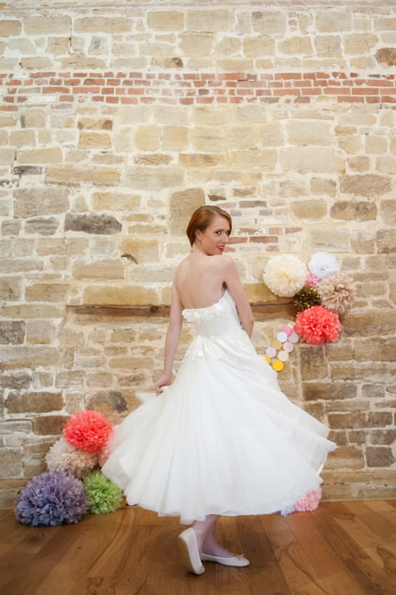 Bride twirling in dress