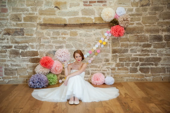 Bride sitting on floor