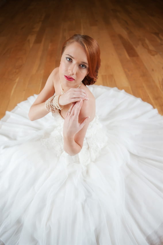 Bride sitting on floor