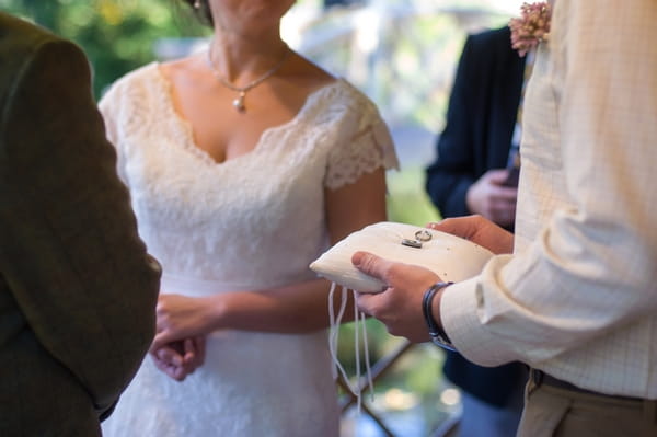 Wedding rings on cushion