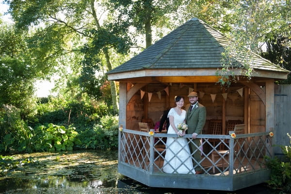 Bride and groom in South Farm Summer House