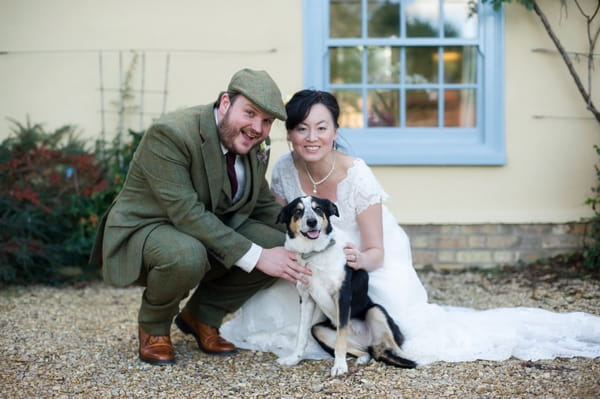 Bride and groom with dog