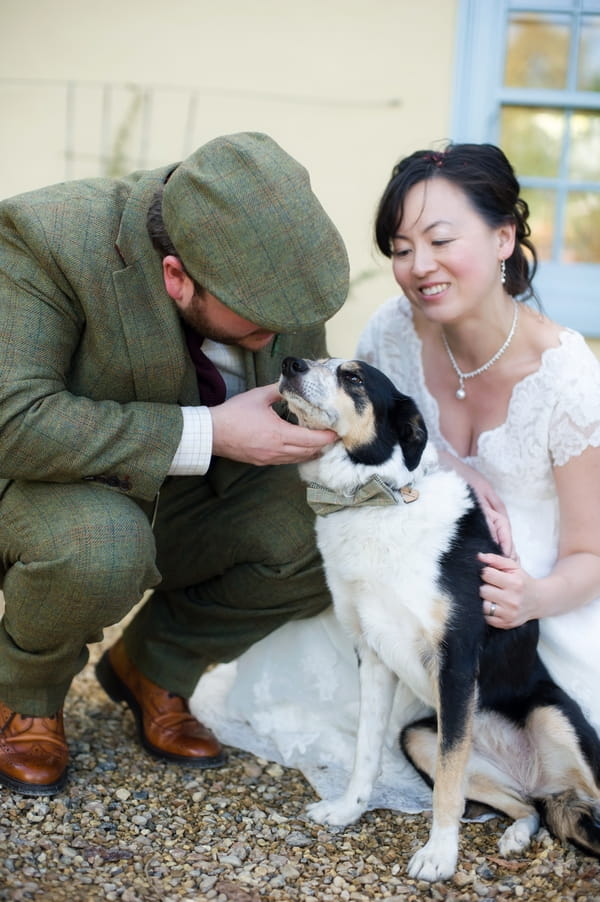 Bride and groom with dog