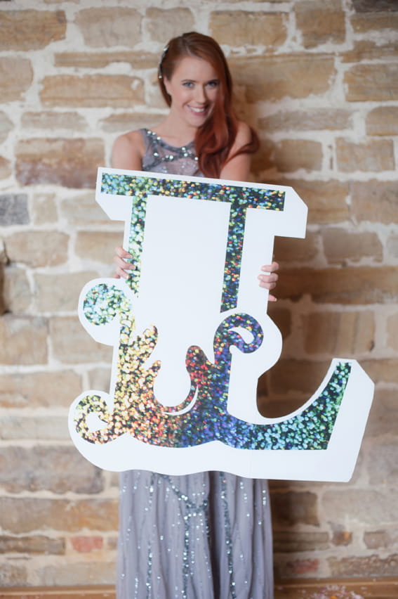 Bride holding letter L