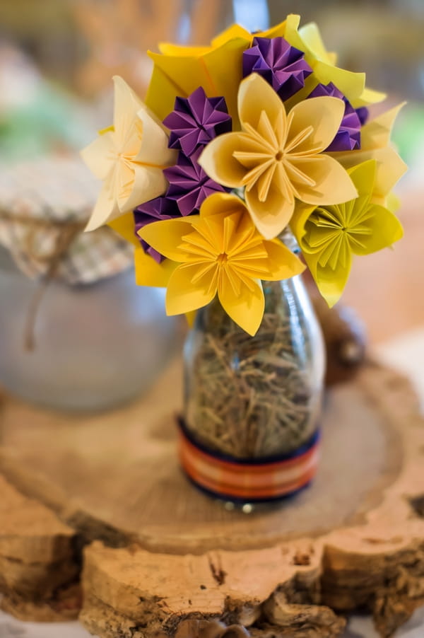 Yellow and purple paper wedding table flowers