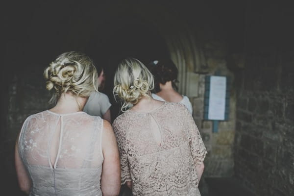 Bridesmaids entering church