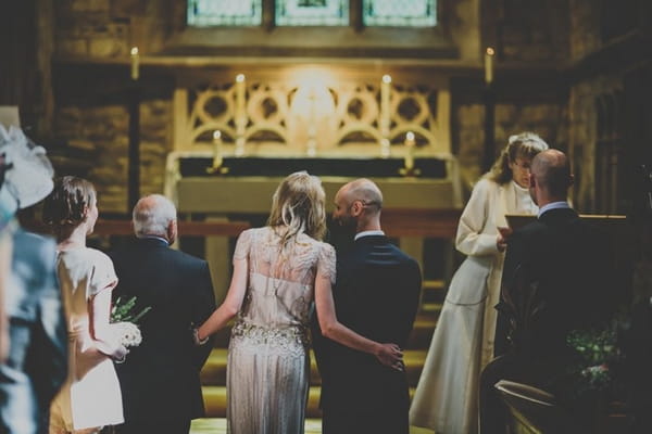 Bride and groom at altar