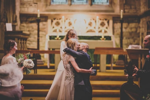 Bride and groom kiss