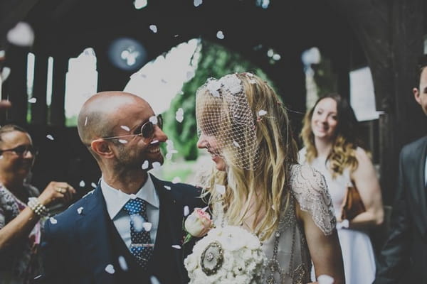 Bride and groom confetti shower