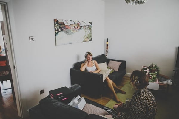 Woman sitting on sofa