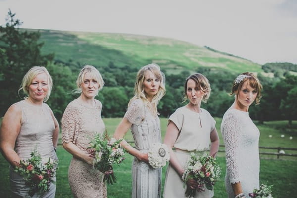 Bride and bridesmaids in a row