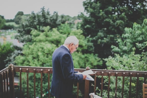 Father checking wedding speech