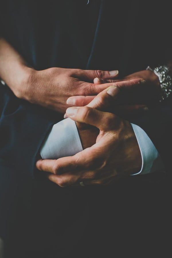 Bride and groom's hands