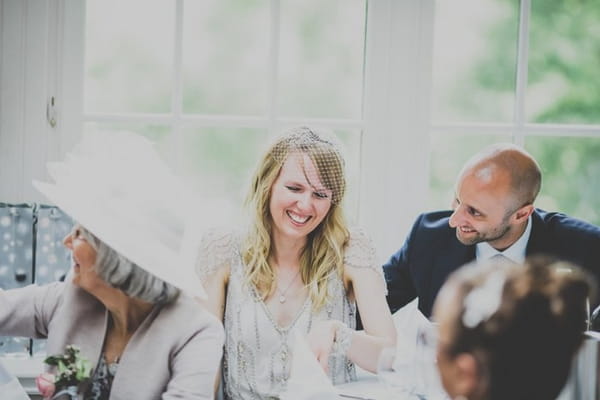 Bride laughing at speech