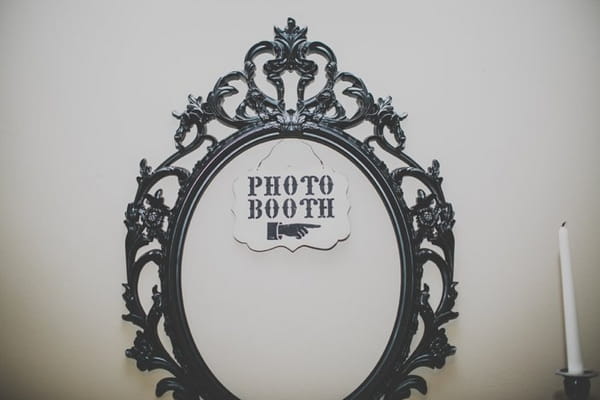 Photo booth sign on mirror