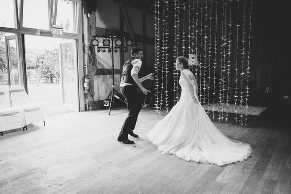 Bride and groom dancing