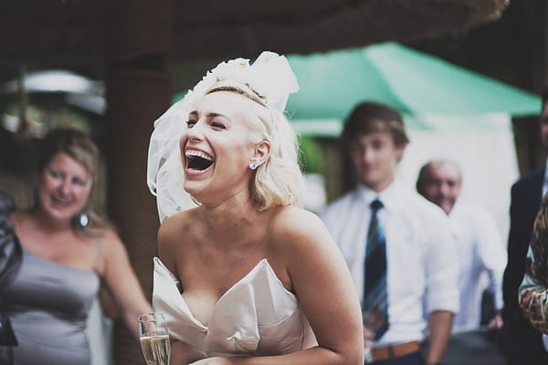 Bride laughing at speech