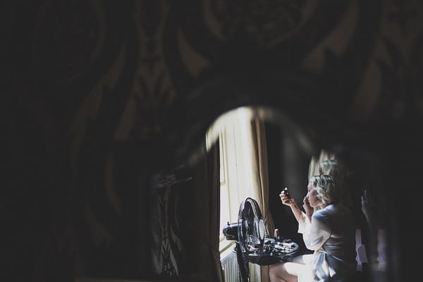 Bride doing make-up