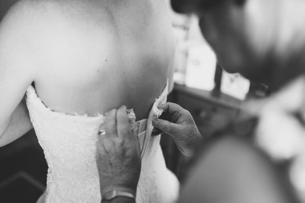 Fastening of brides dress