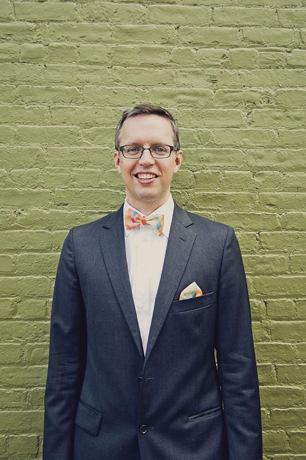 Groomsman with colourful bow tie and hanky