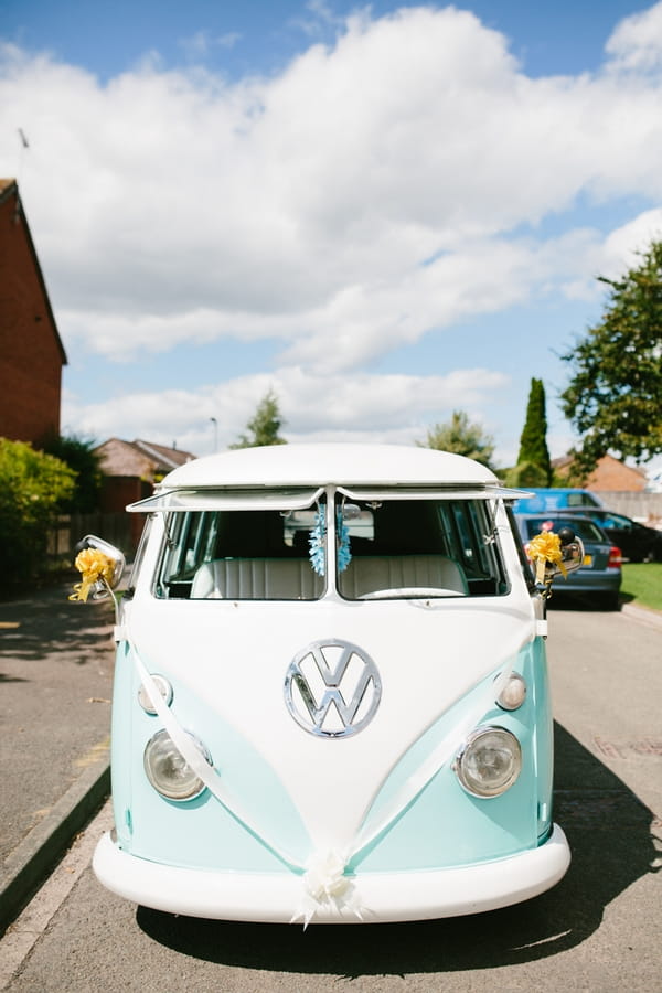 Front of turquoise VW Camper Van