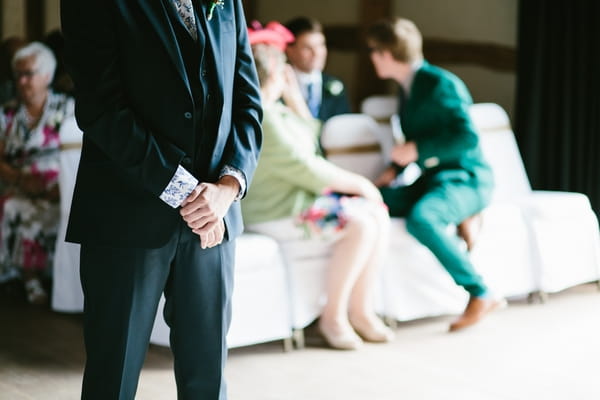 Groom waiting at altar