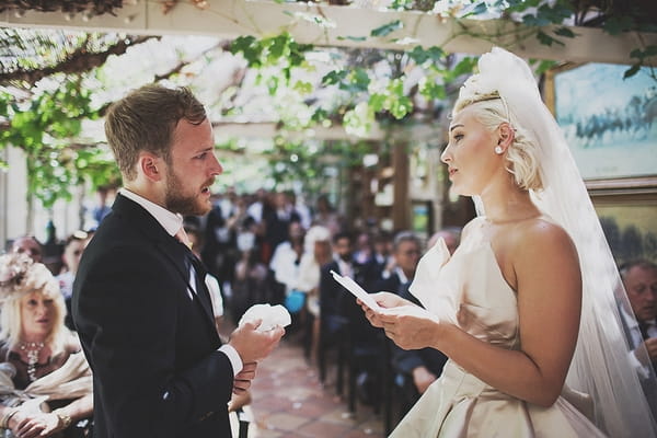 Bride reading in wedding ceremony