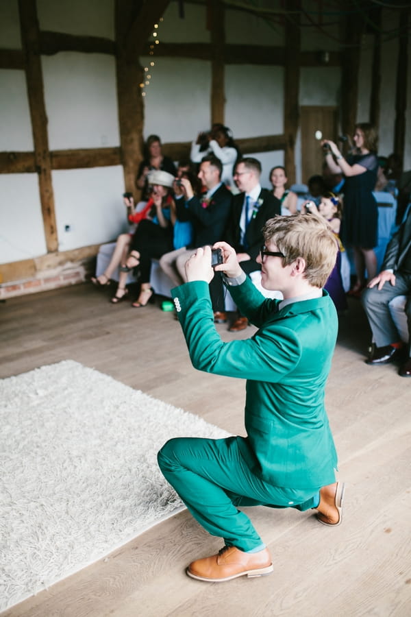 Wedding guest taking picture