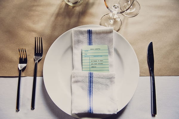 Message inside napkin on wedding table