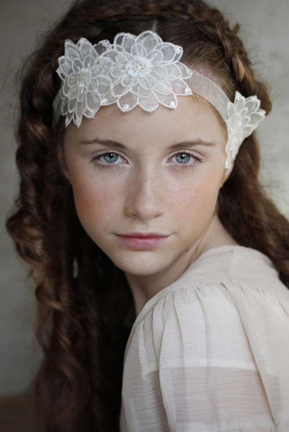 Flower girl with lace headpiece