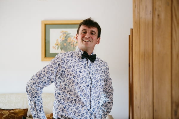 Groom in floral shirt