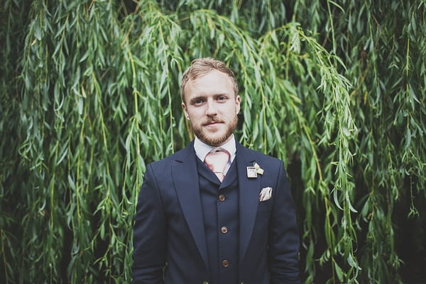 Groom in blue suit