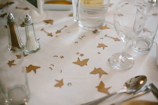 Paper cut outs on wedding table