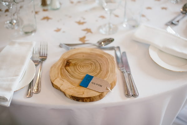 Groom log place setting