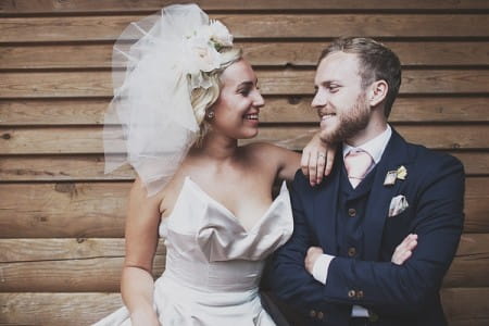 Bride leaning on groom's shoulder